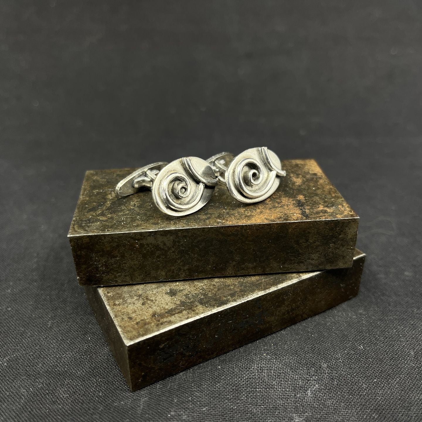 A pair of cufflinks from the 1950s