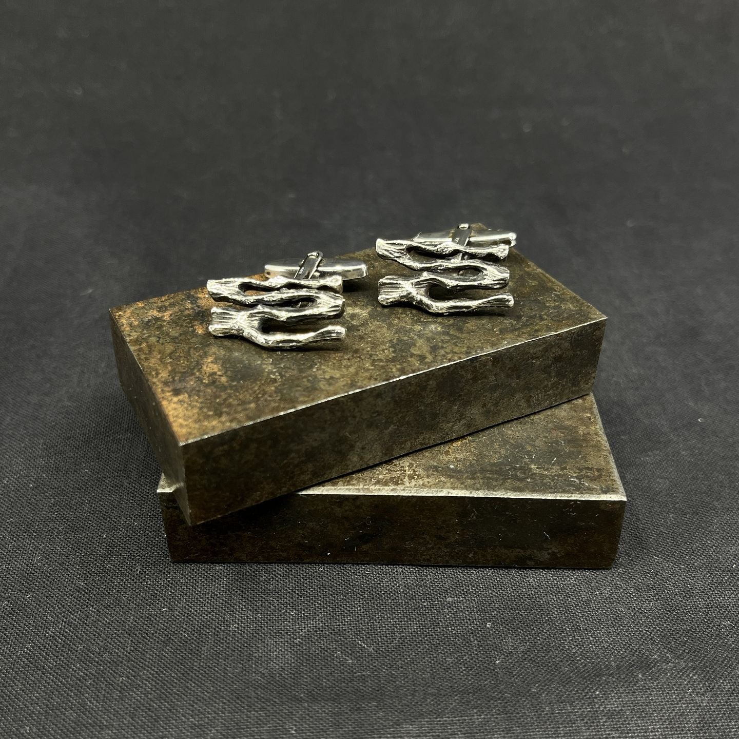 A pair of modernist cufflinks