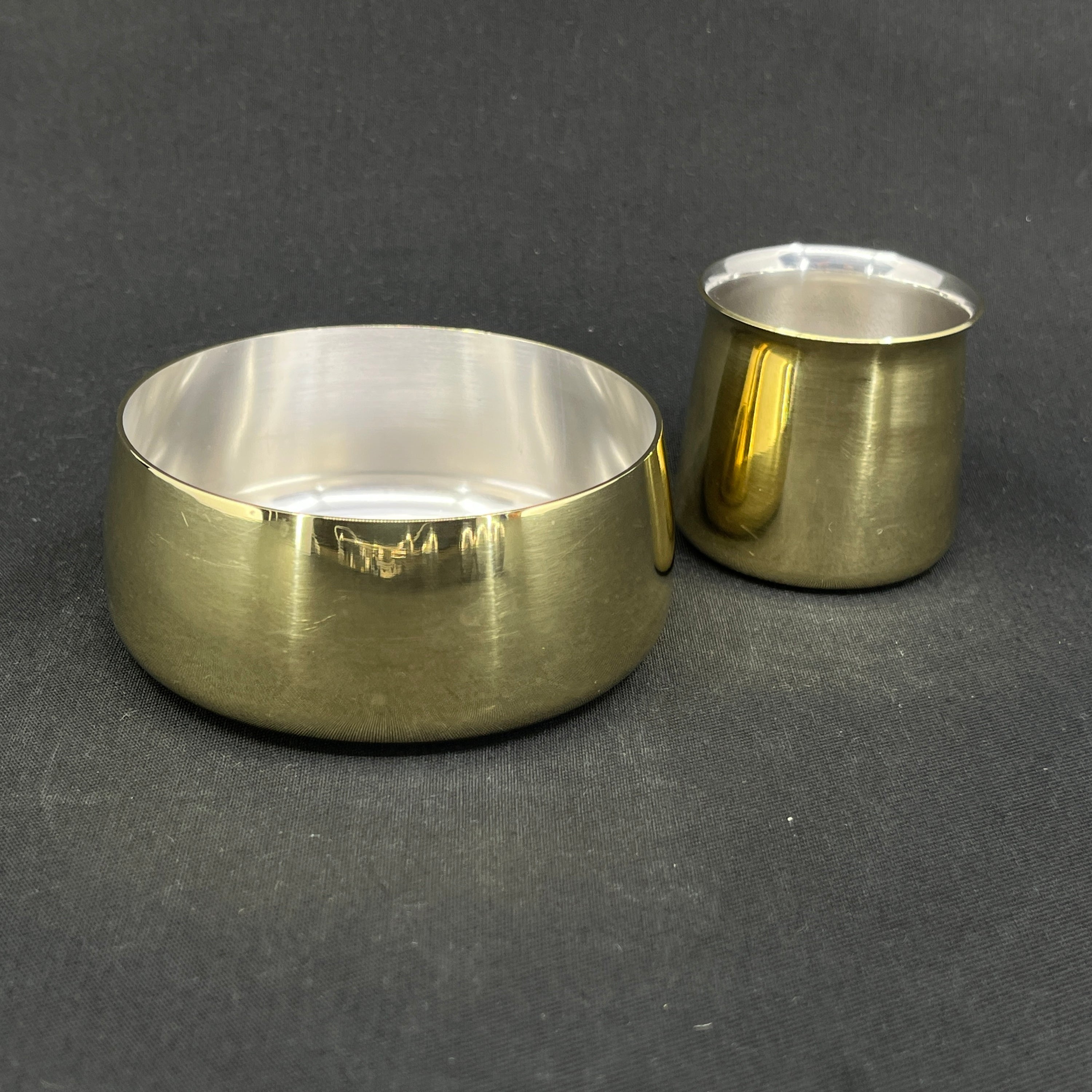 Brass sugar bowl and cream jug by Henning Koppel