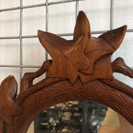 Mirror cut with ivy