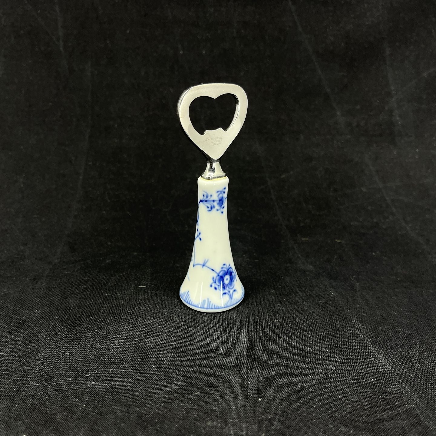 Musselmalet Riflet oplukker