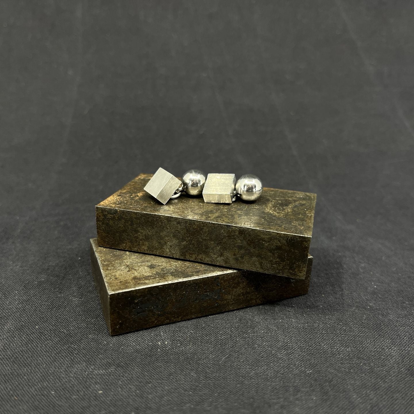 A pair of modern cufflinks in silver