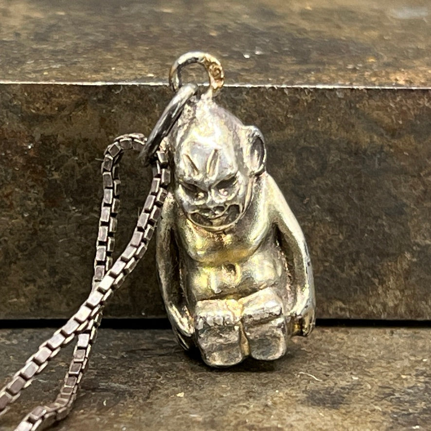 Modern silver pendant - small figurine