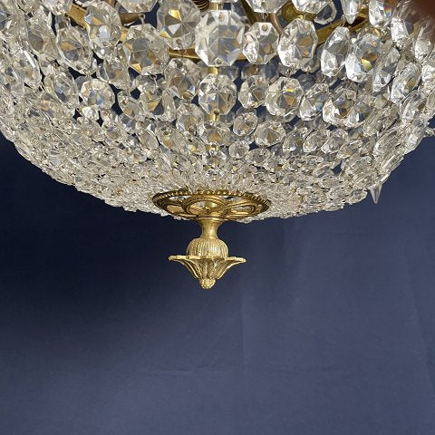 Fine old chandelier with gilded frame