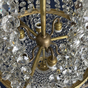 Fine old chandelier with gilded frame