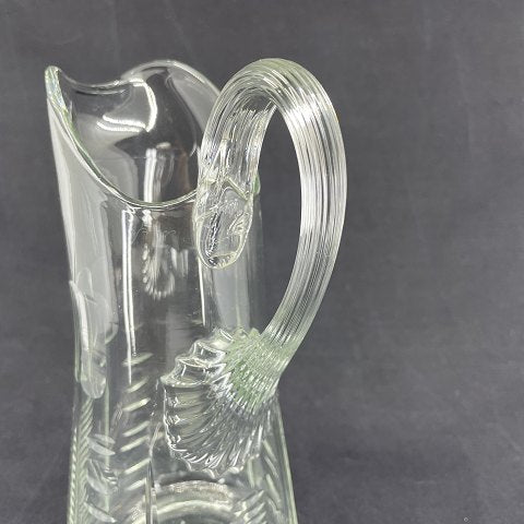 Fine glass jug with many cuts