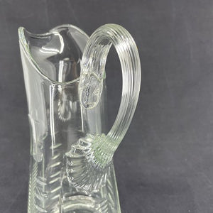 Fine glass jug with many cuts