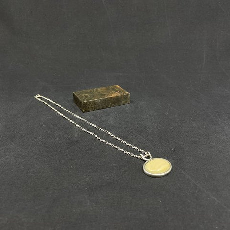 Pendant with legs from NE From