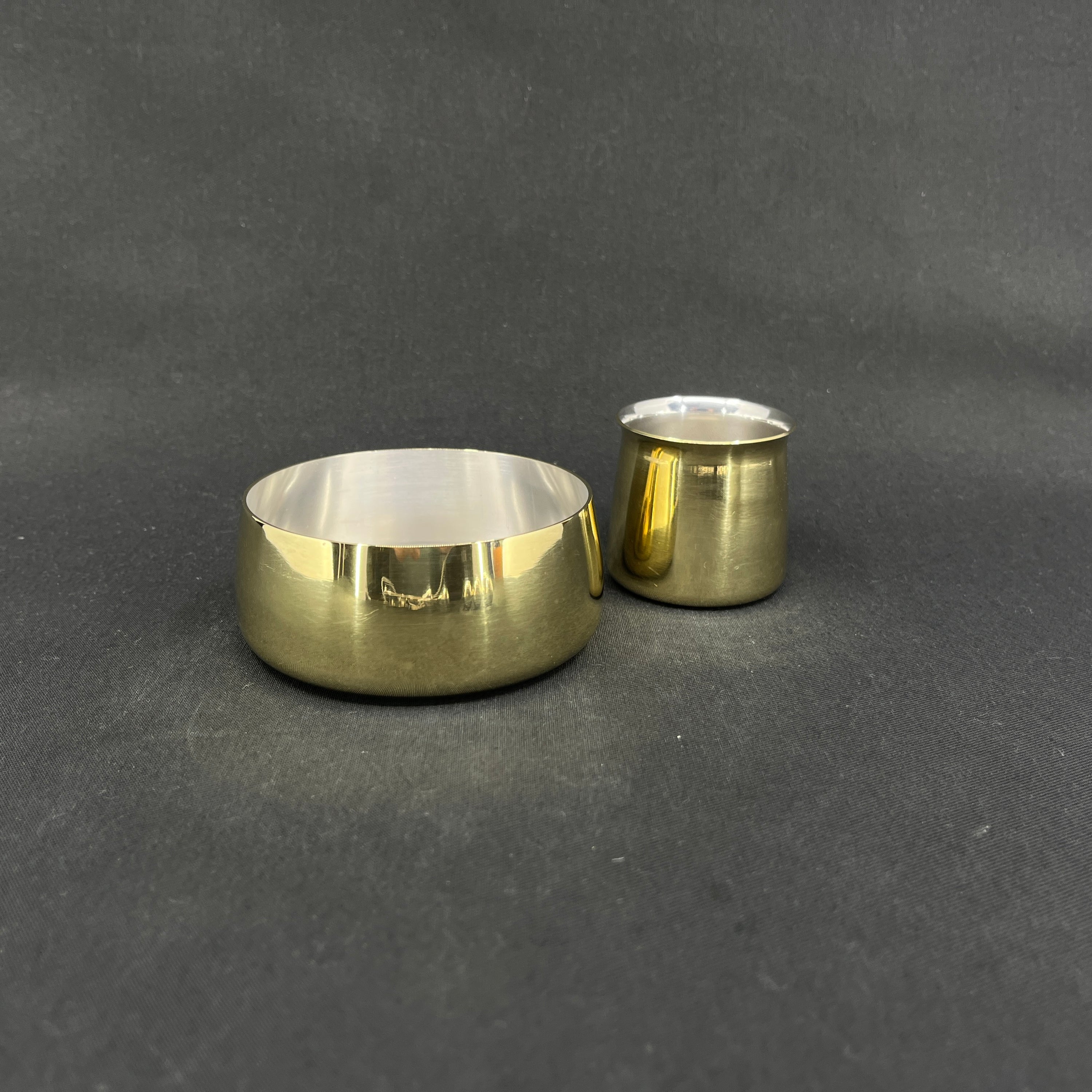 Brass sugar bowl and cream jug by Henning Koppel
