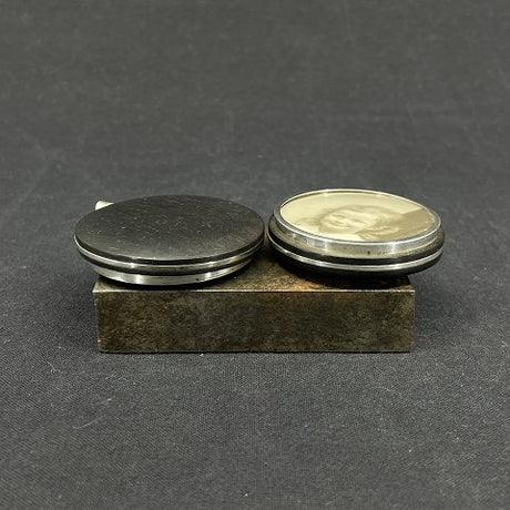 A pair of pendants with room for pictures