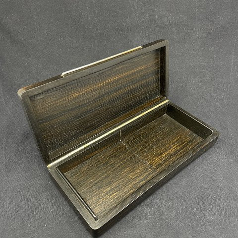 Box in moss oak with silver inlay from Thule