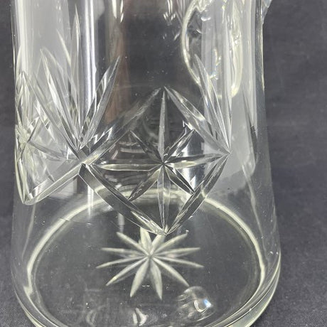 Large glass jug with grindings