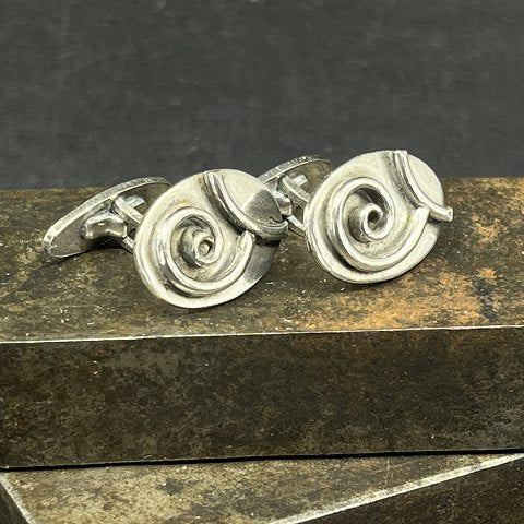 A pair of cufflinks from the 1950s