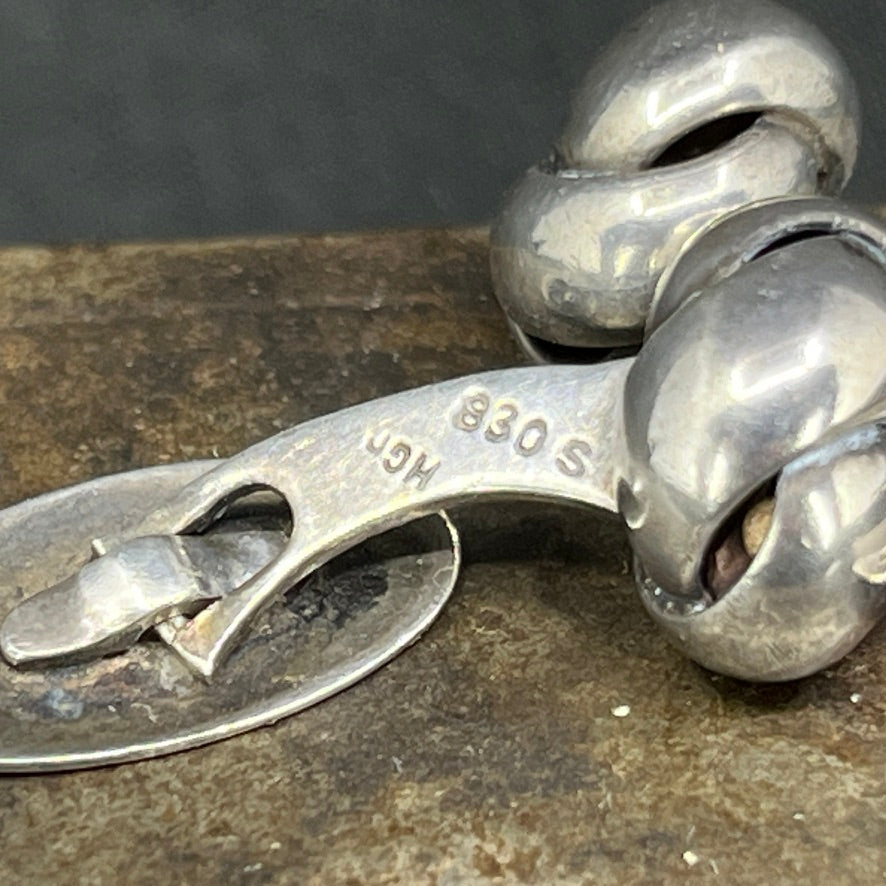 A pair of cufflinks - knots