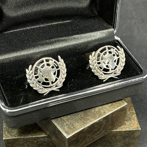 A pair of FN cufflinks