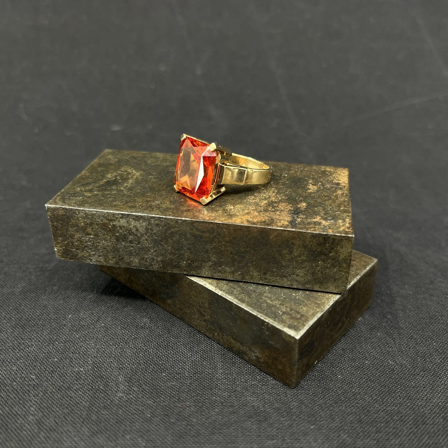 Modern cocktail ring with orange stones