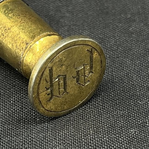 Signet i glas fra 1900 tallets begyndelse