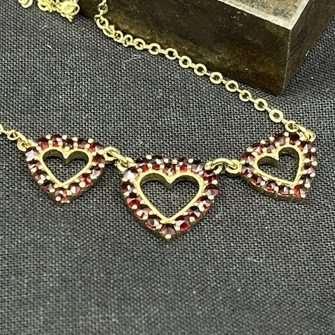 Necklace with garnets, hearts