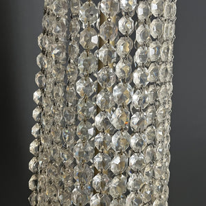 Large chandelier with glass leaves and a garland