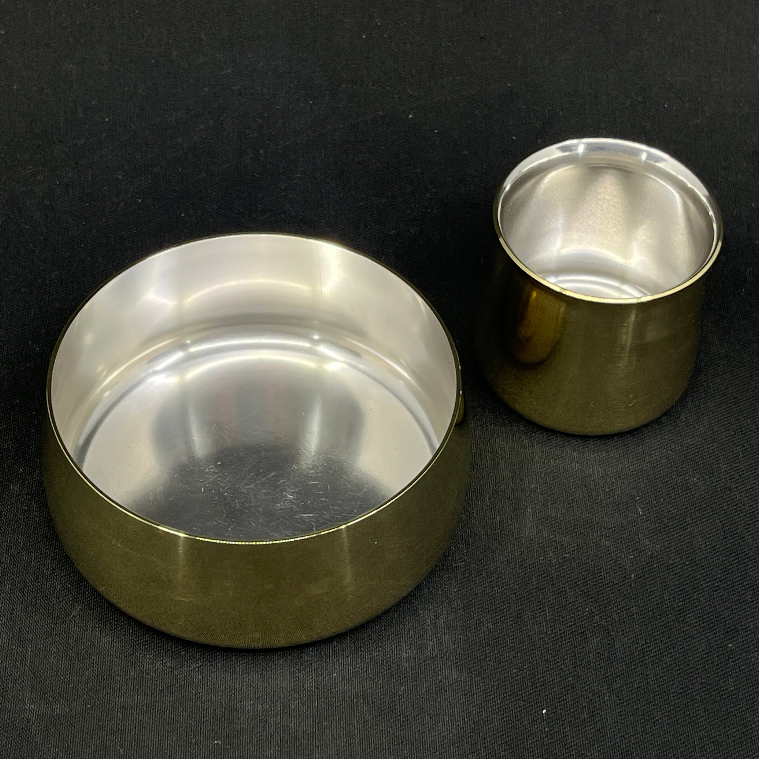 Brass sugar bowl and cream jug by Henning Koppel