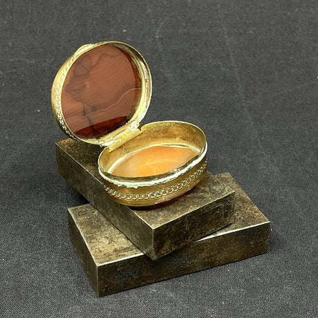 Oval pill box with ribbon agate
