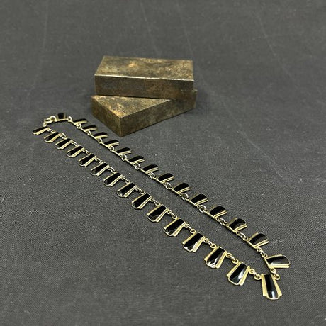 Necklace with black enamel by Volmer Bahner