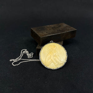 Bone pendant set in silver