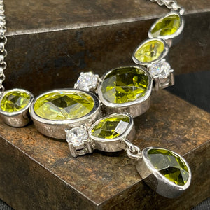 Necklace in silver with green stones