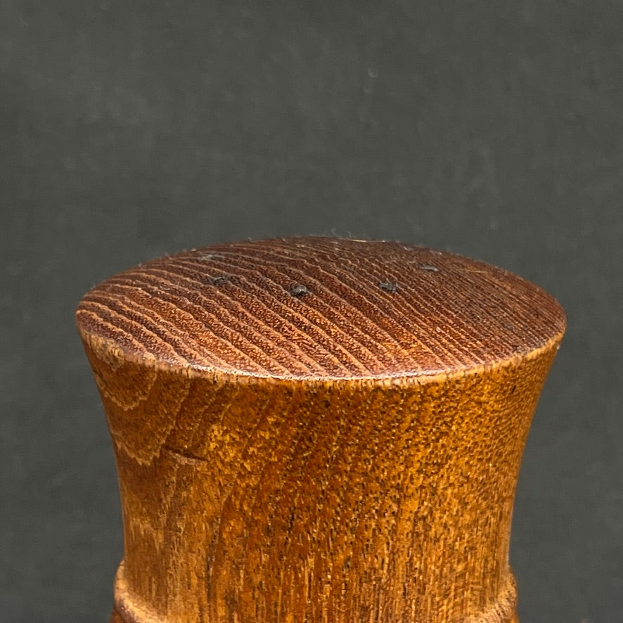 Modern pepper mill in teak