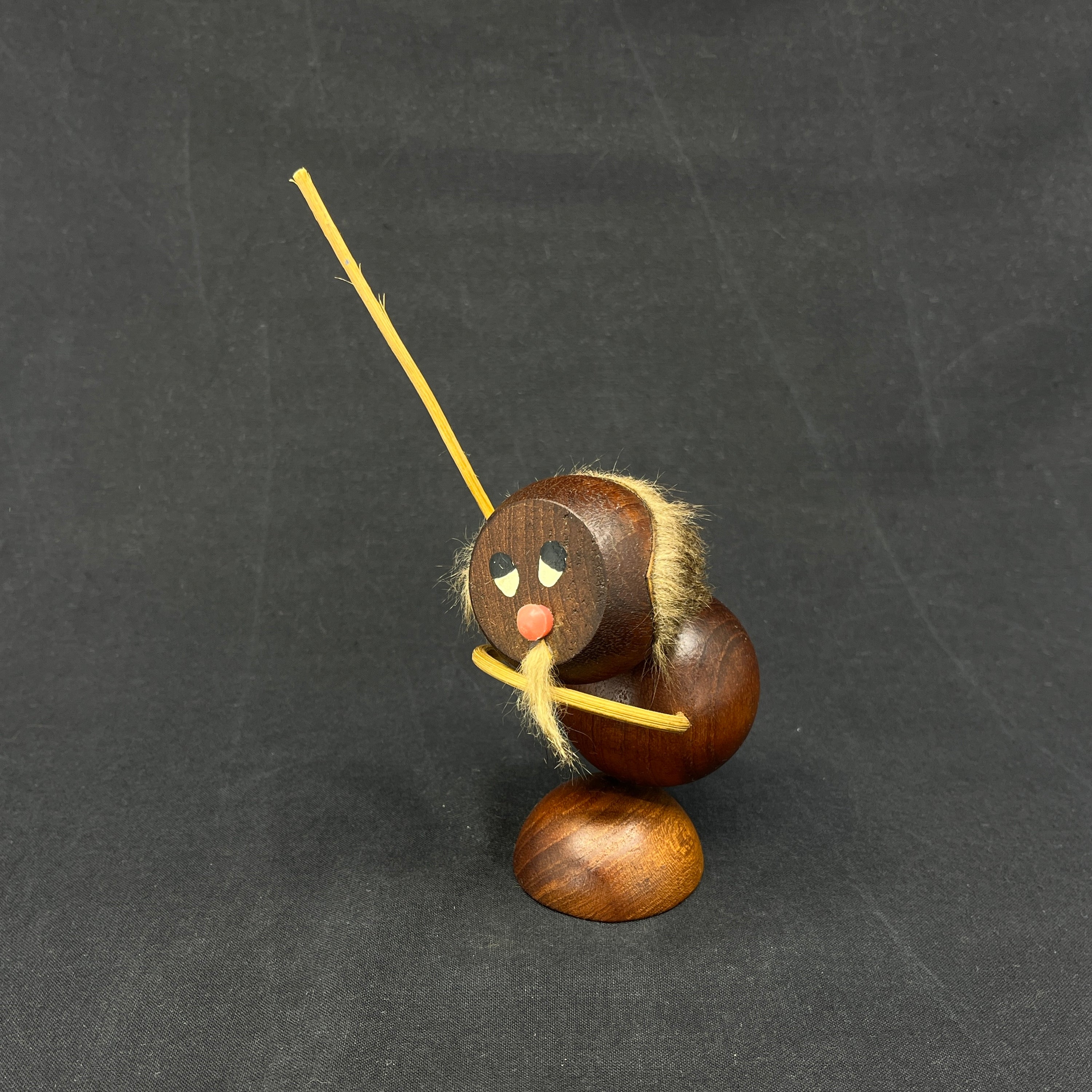 Teak wood figurine - man with pole