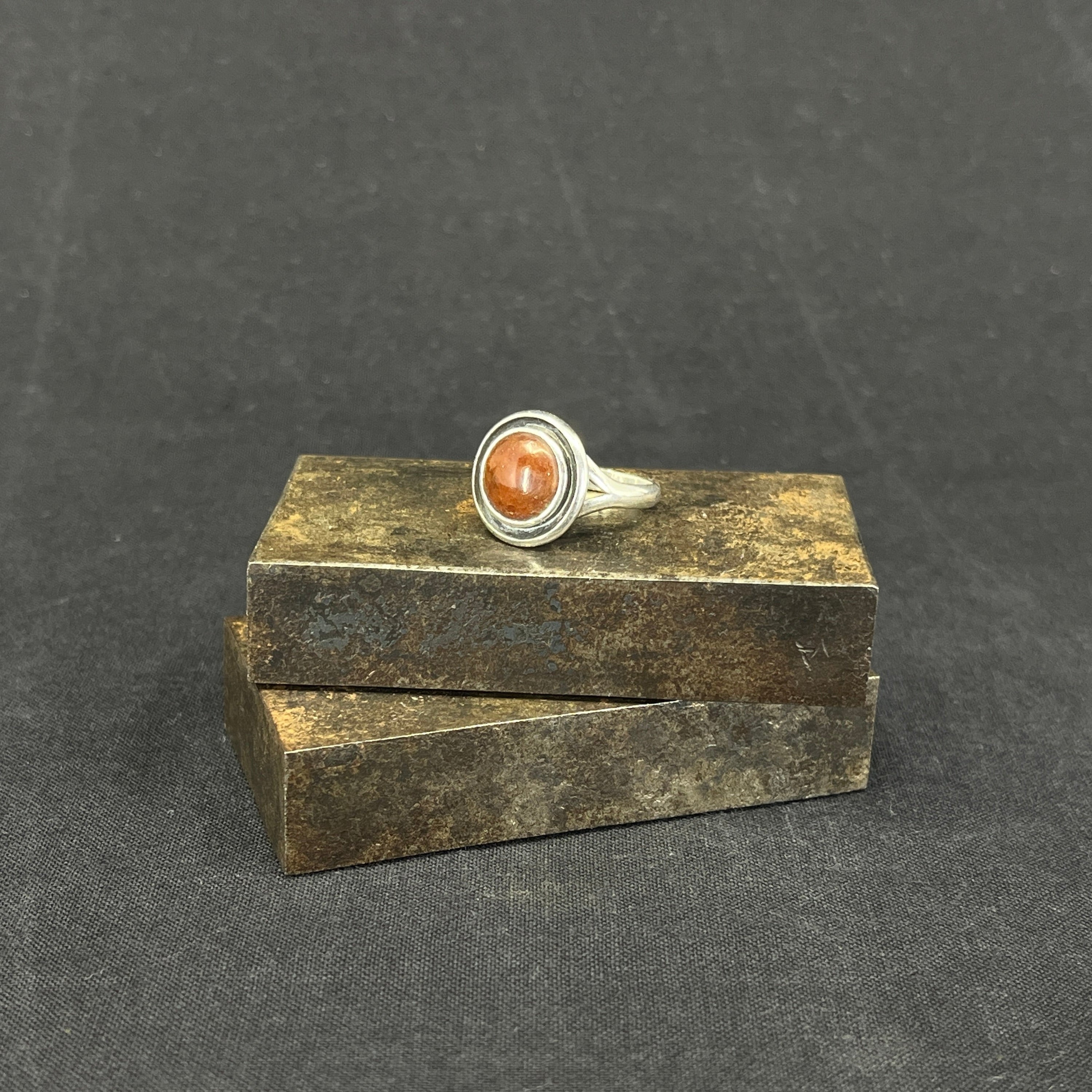 Modern ring with amber from NE From