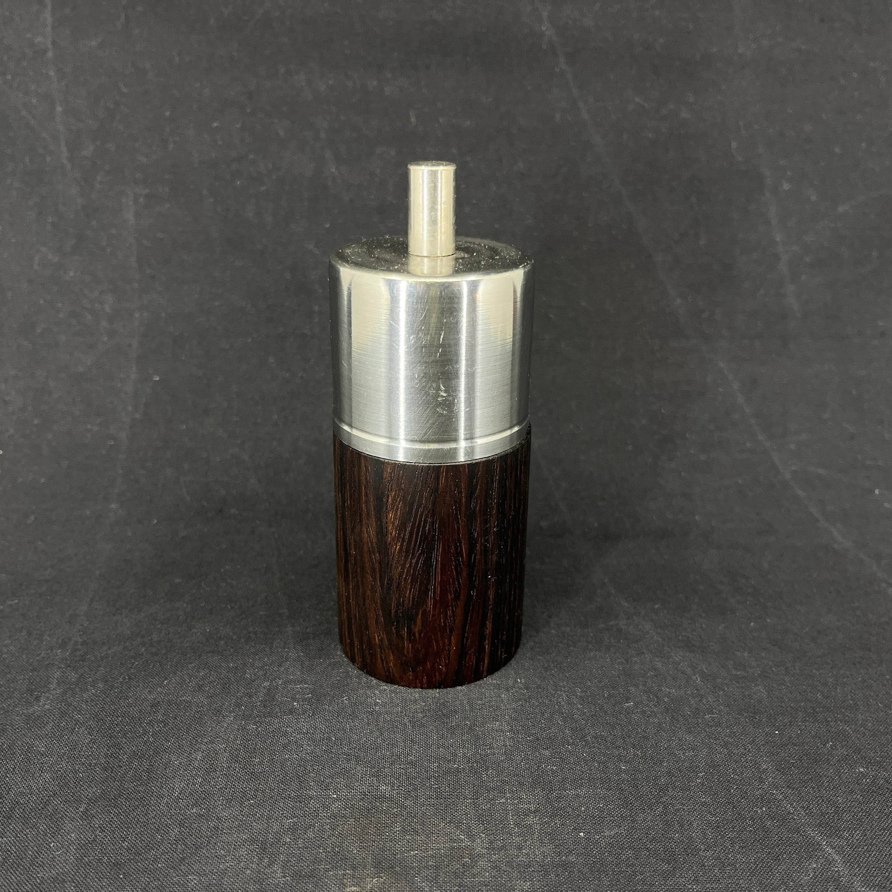 Modern pepper mill in rosewood