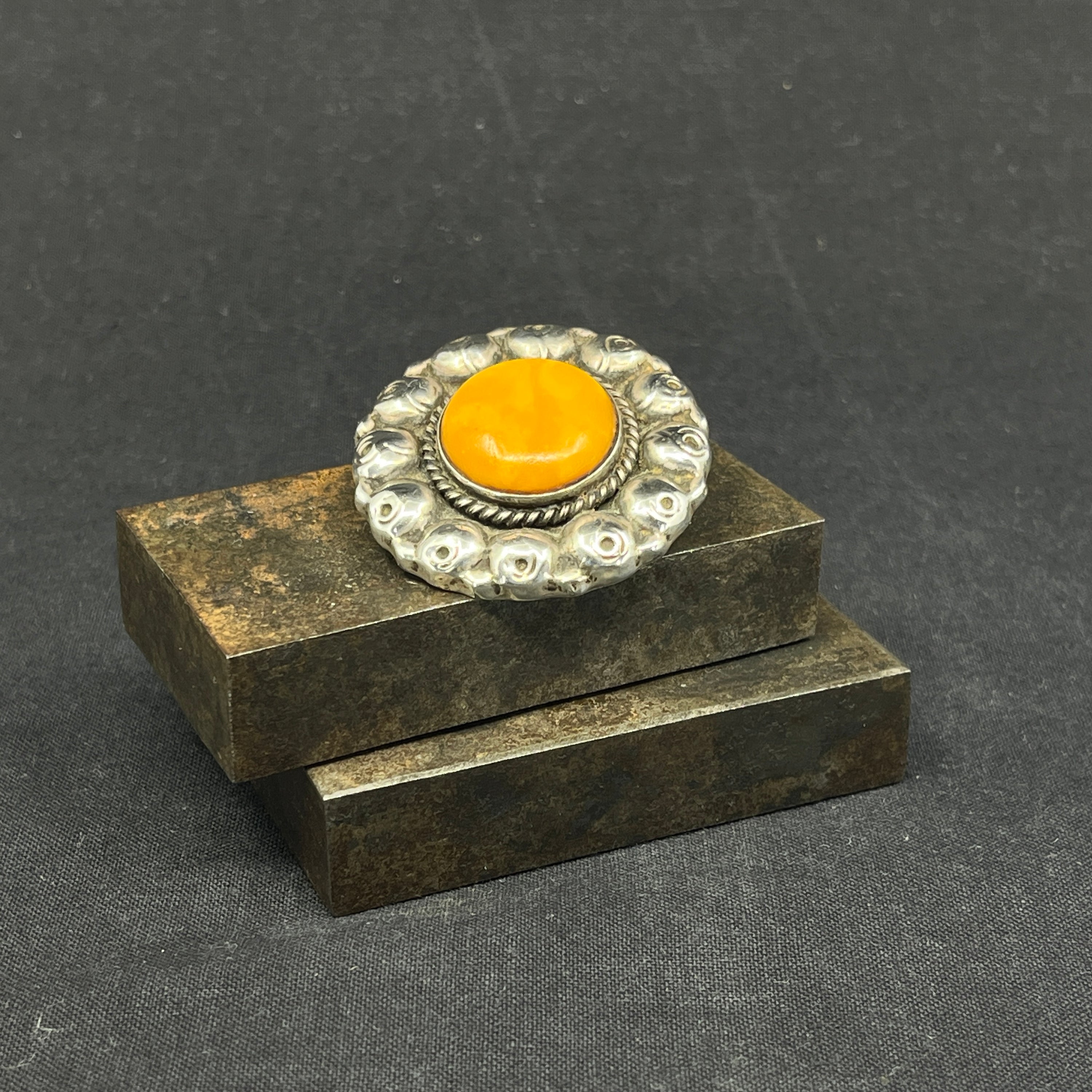Brooch with milk amber
