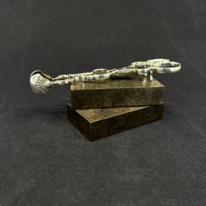 Baroque sugar tongs in silver