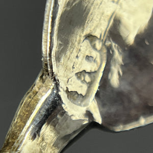Baroque sugar tongs in silver
