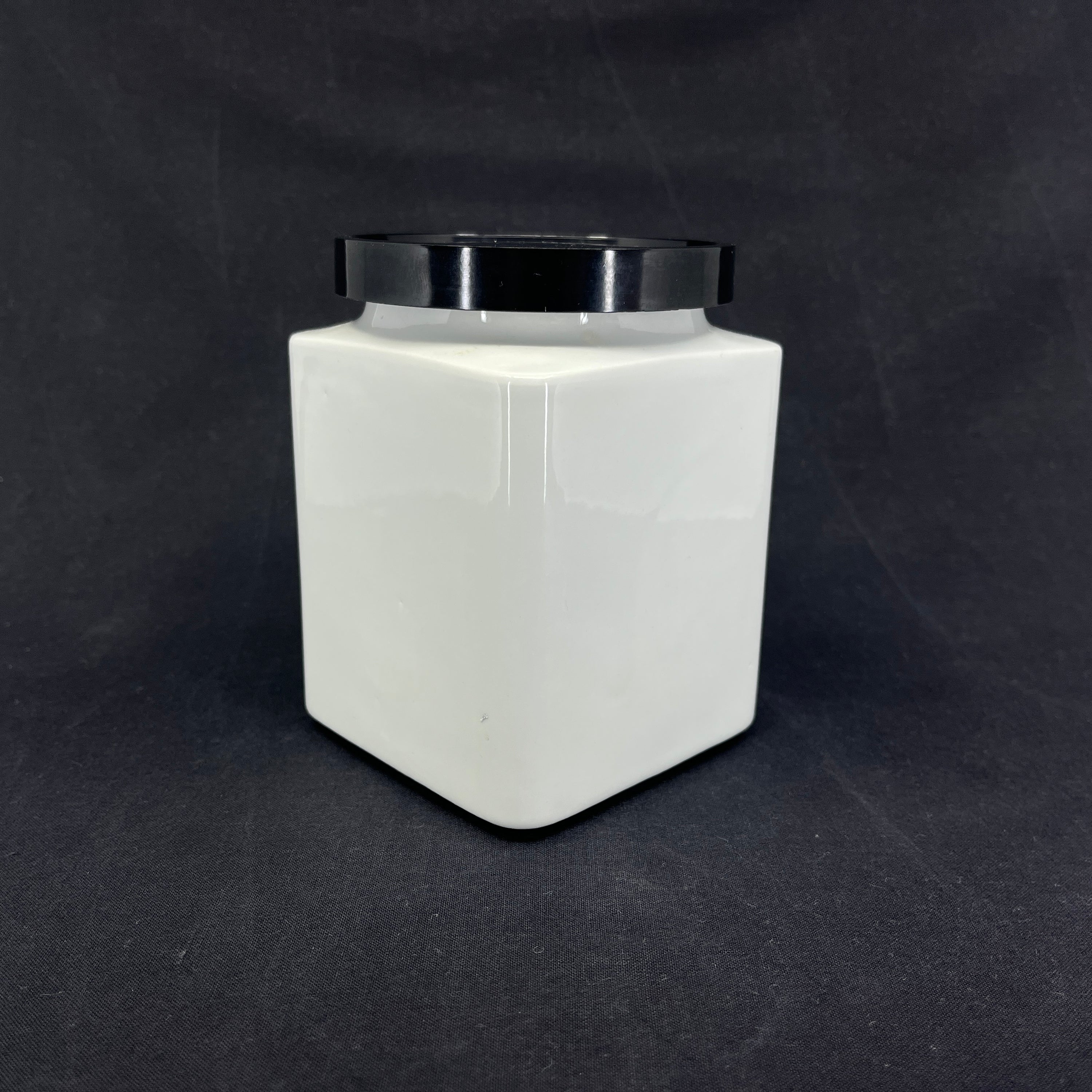 Arabia storage jar with black lid