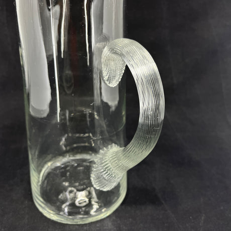 Glass jug with snail handle