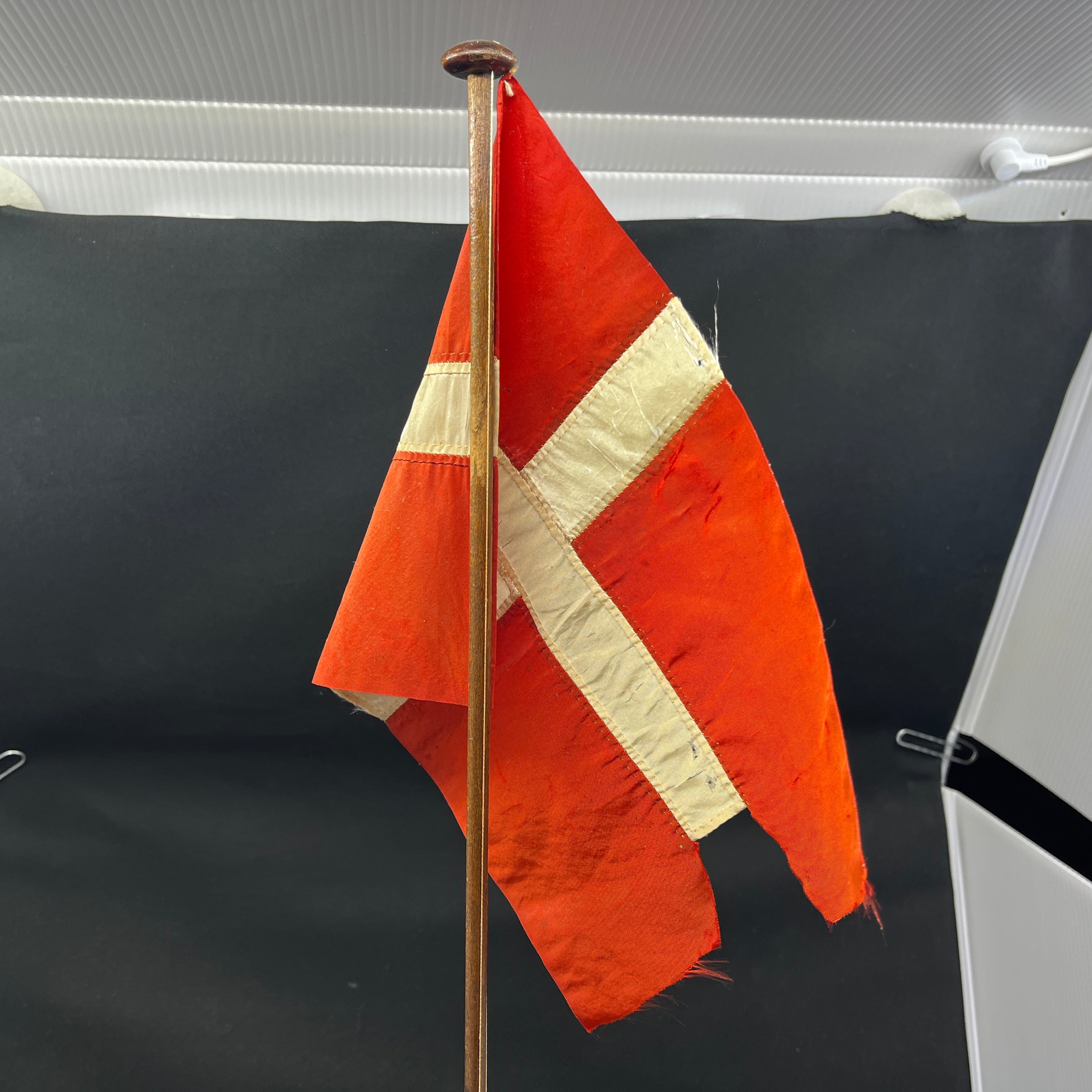 Tall wooden flagpole
