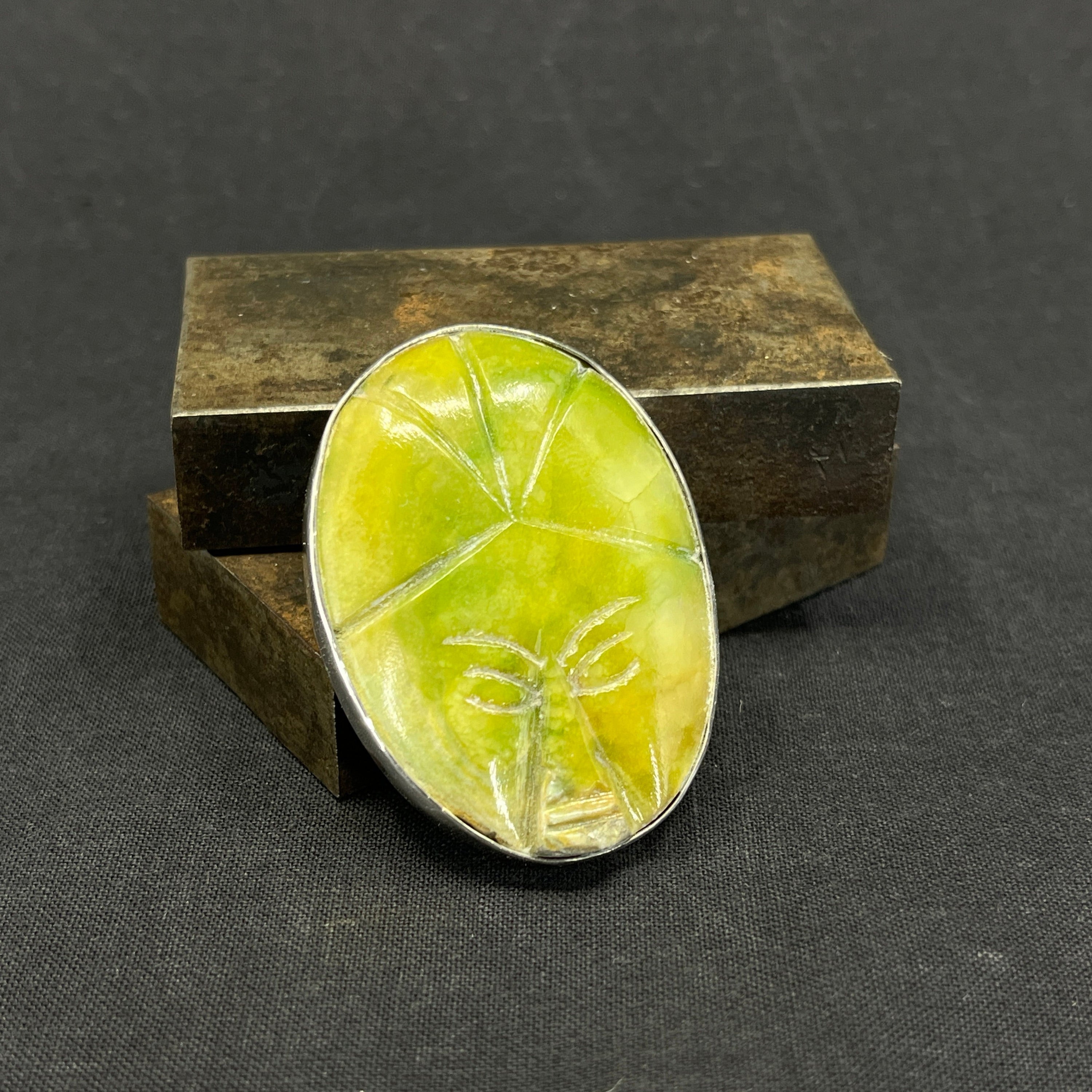 Silver pendant with green stone