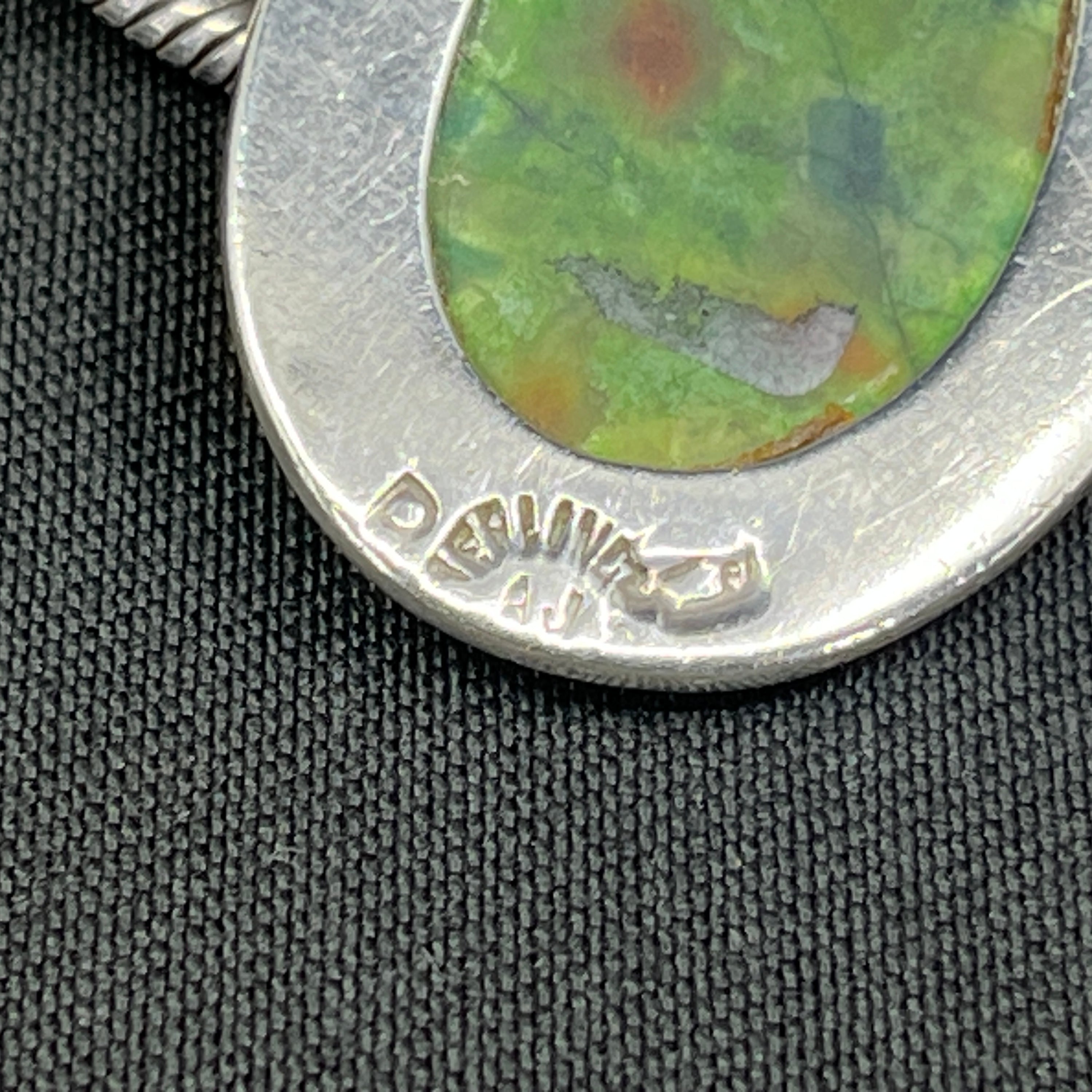 Modern pendant with green stone