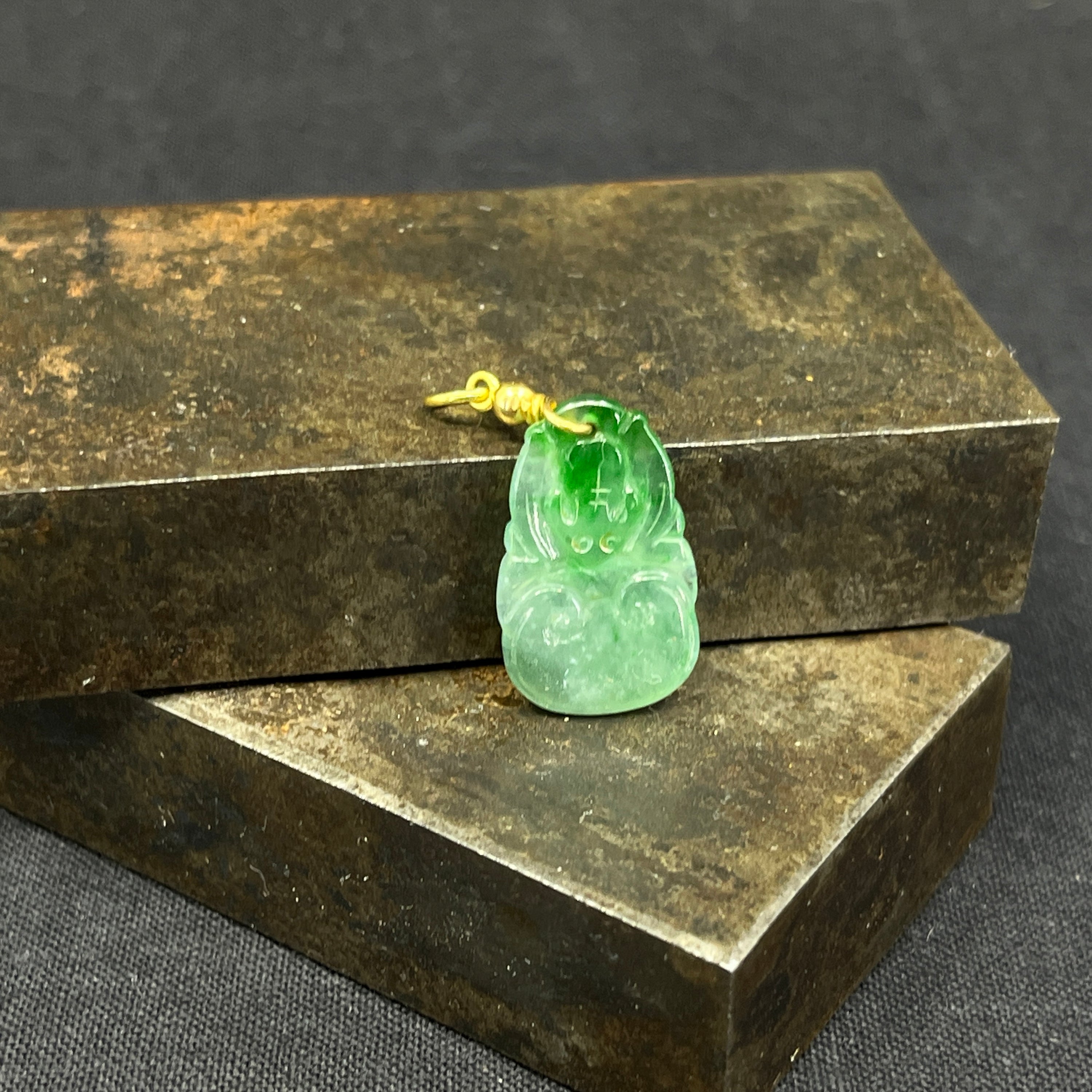 Jade pendant with gold