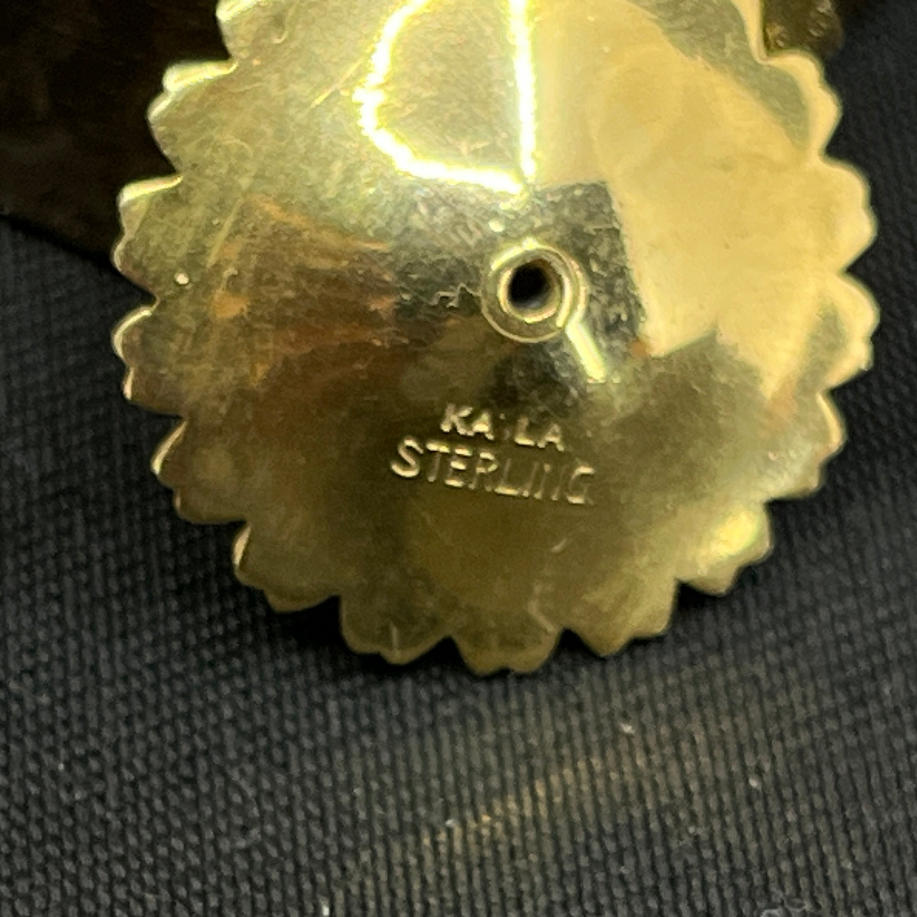 Daisy pendant by Kala