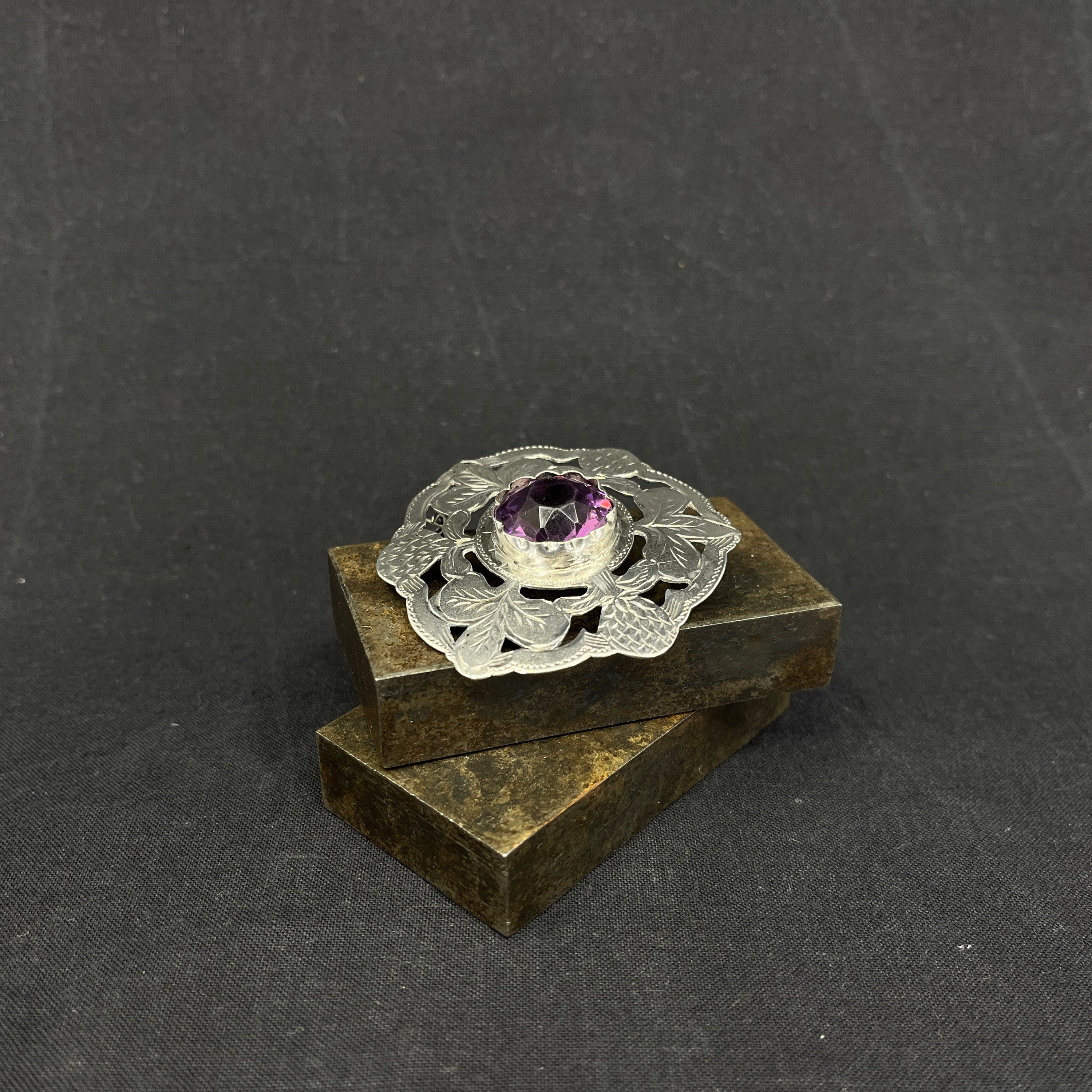 Brooch with thistles