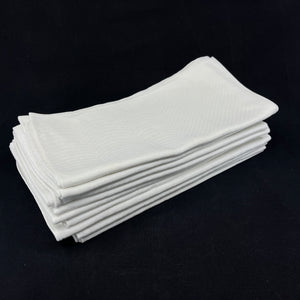 10 identical damask napkins, 55x55 cm.