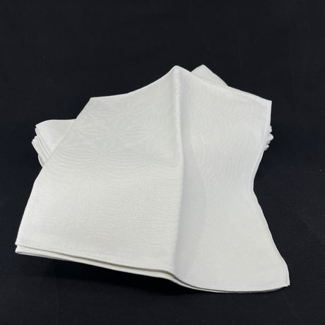 10 identical damask napkins, 55x55 cm.