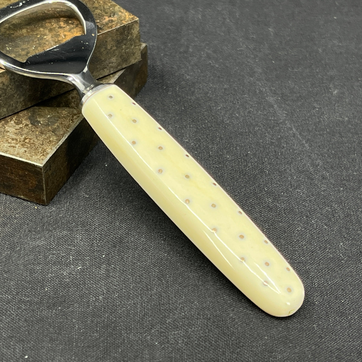 Opener in ivory and silver