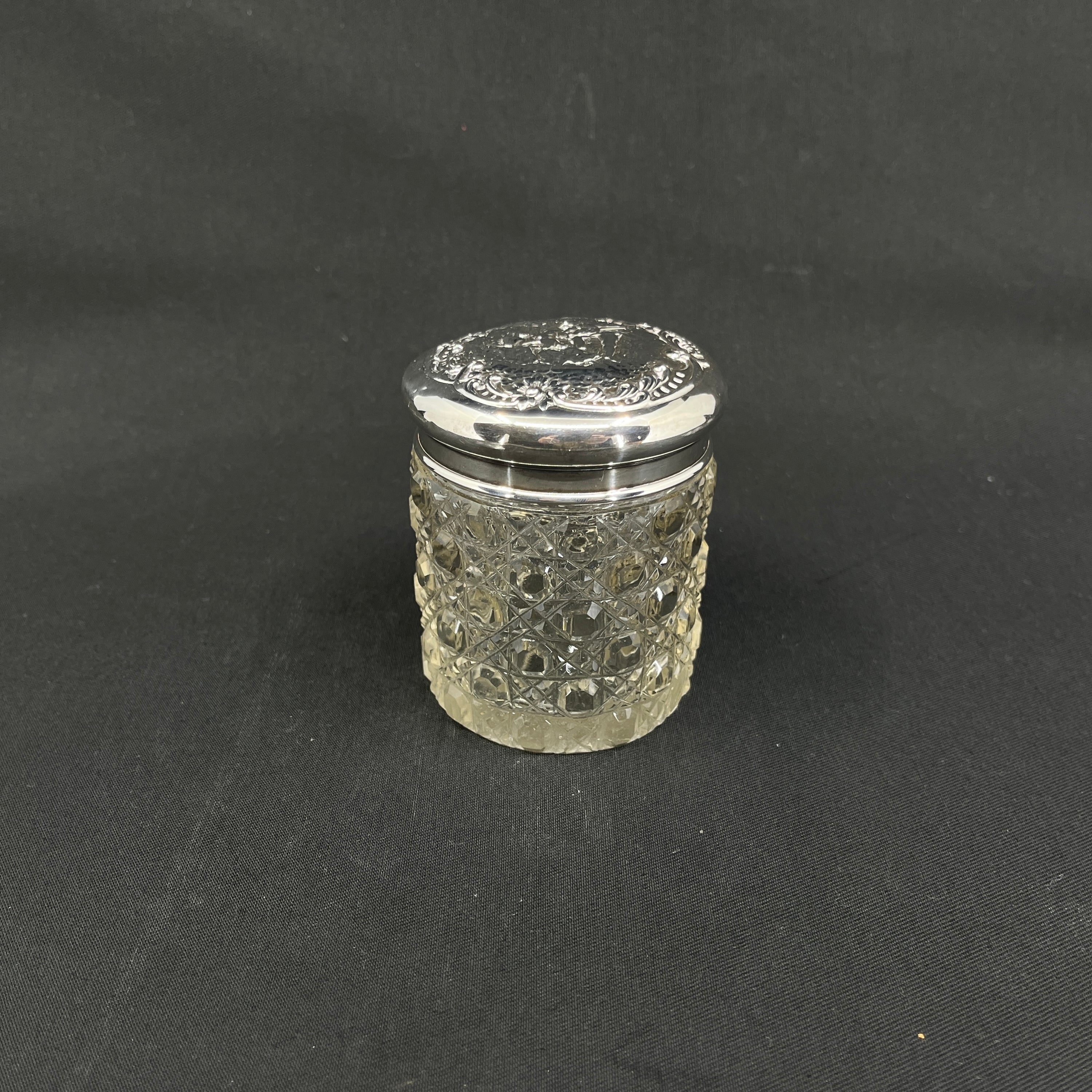 English tin with silver lid