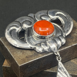 Large fine wood brooch with amber
