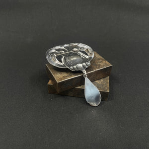 Large fine wood brooch with amber