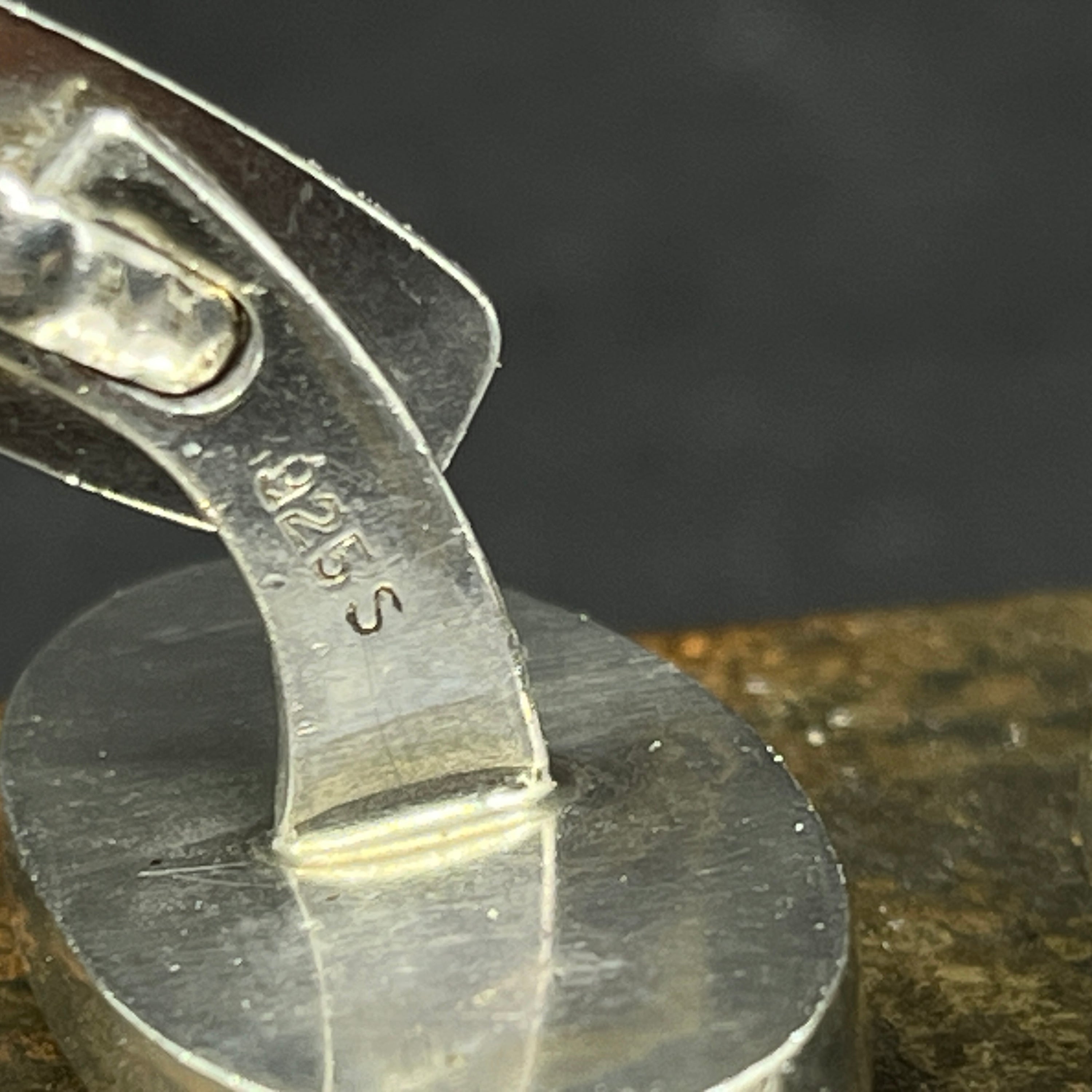 A pair of oval onyx cufflinks